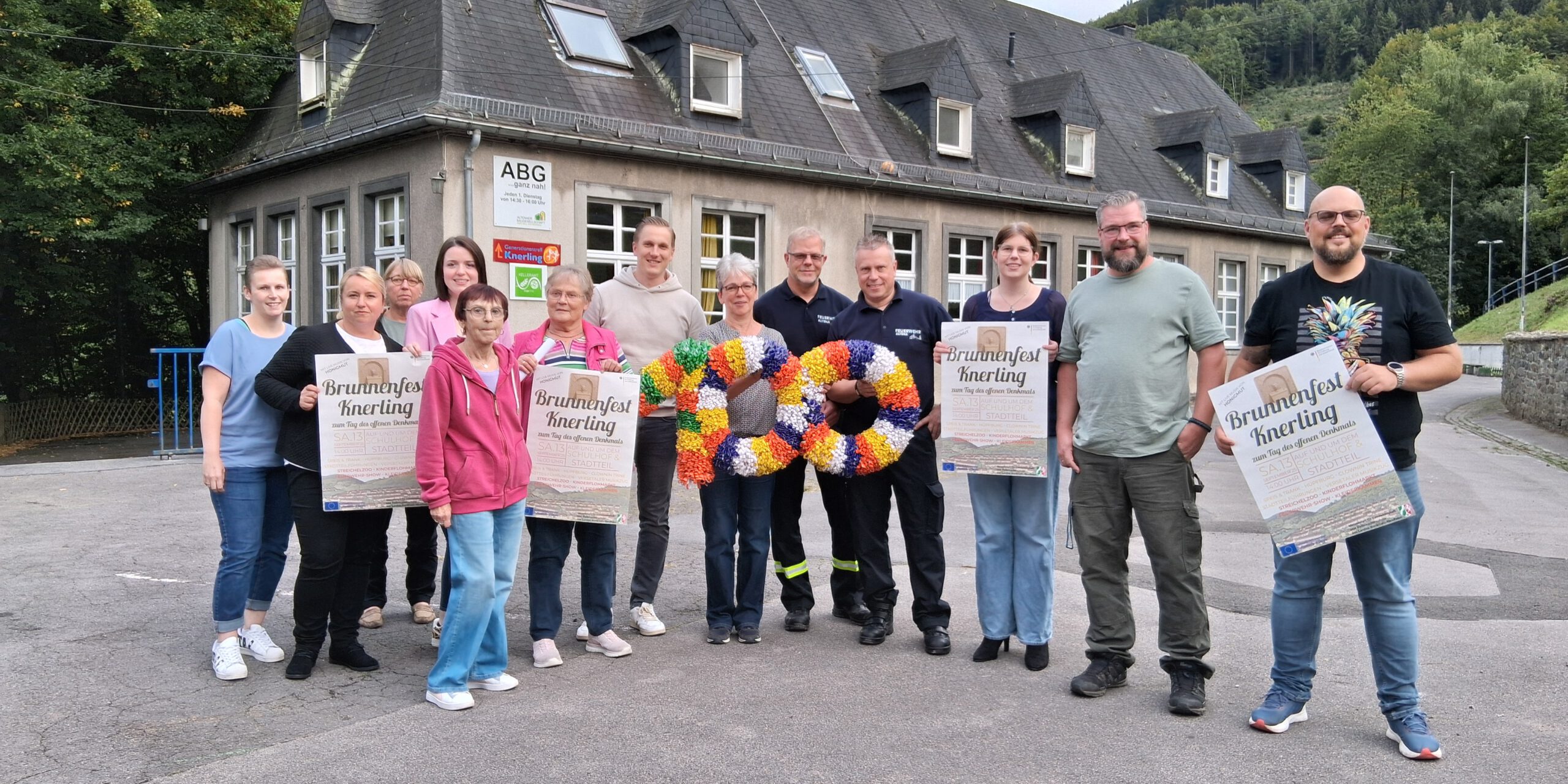 Initiatoren des Brunnenfestes in Altena werben für die Veranstaltung.