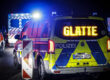 Ein Polizeiauto mit dem Schriftzug "Glätte"